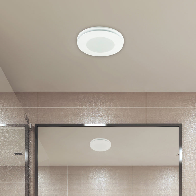 Ceiling light fixture in a bathroom with tiled walls and a shower area.
