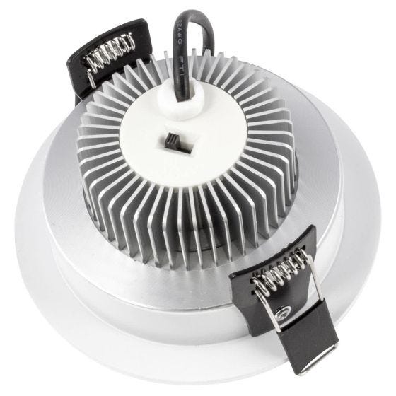 Close-up of a ceiling light fixture with metallic finish and black clips on a white background