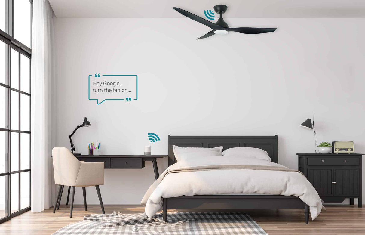 Modern bedroom with a ceiling fan and smart home devices.