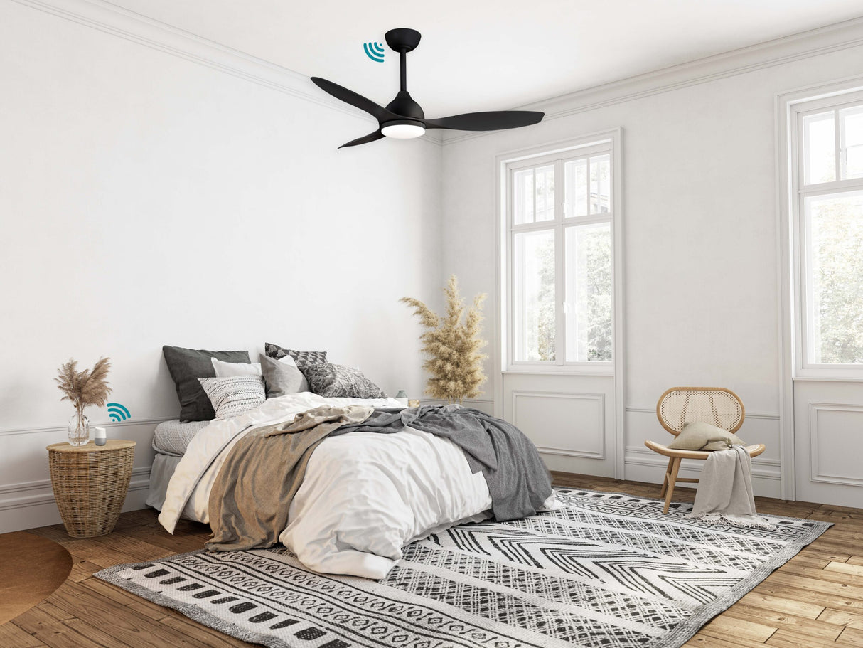 Stylish DC ceiling fan with WiFi connectivity and LED light from Martec Elite in a bedroom with a bed, rug, and window.