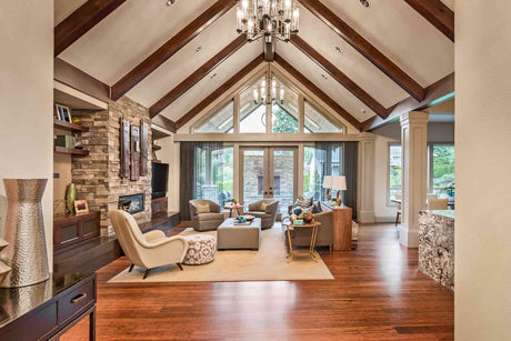 a living room with sloped ceiling  lights