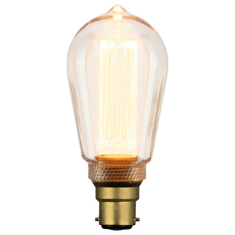 Mercator ST64 B22 vintage decorative LED globe with a clear glass shade and brass base on a white background