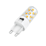 Energy-efficient Domus KEY G9 4W dimmable tricolour LED bulb on a white background