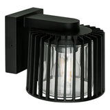 Black outdoor wall light fixture with clear glass cover on a white background