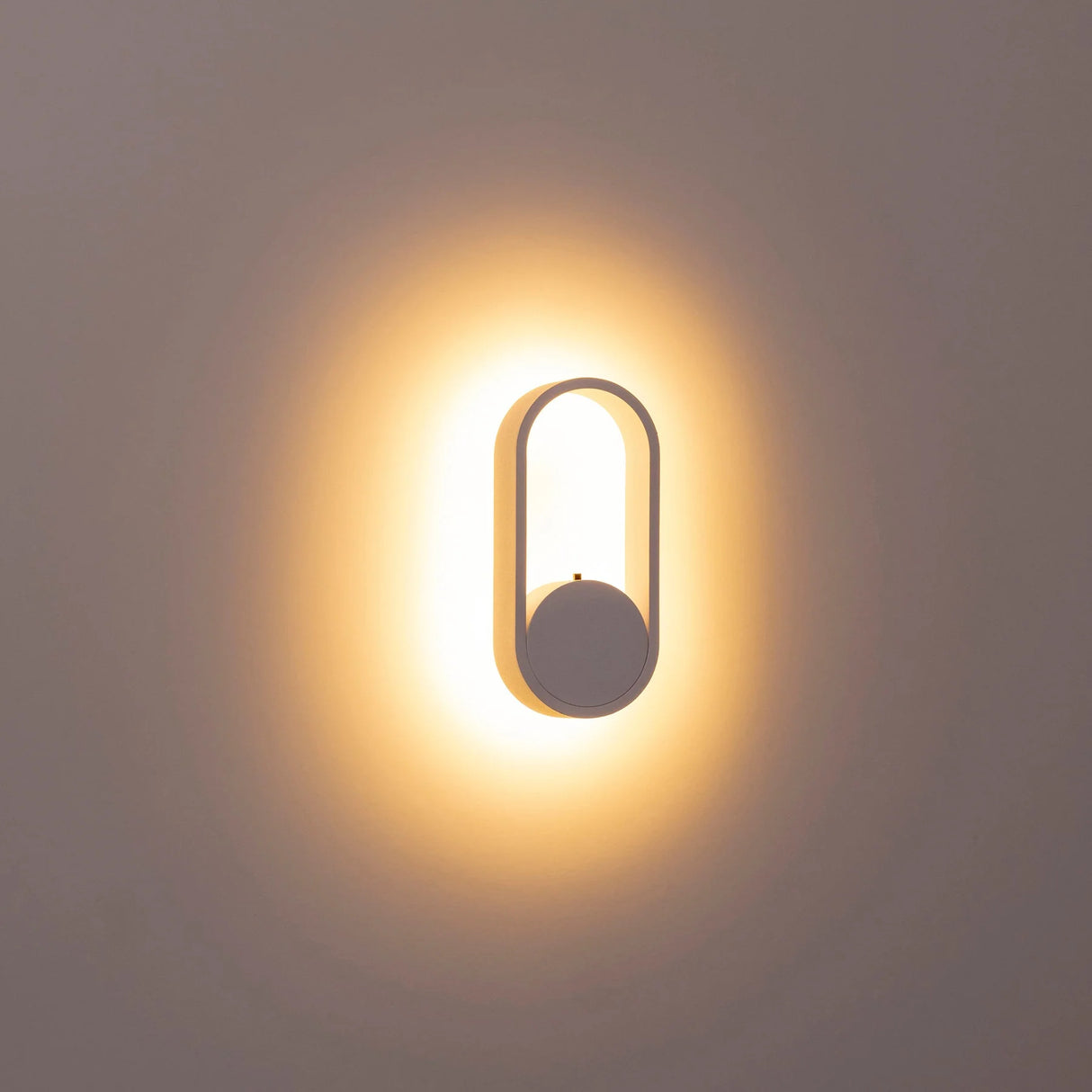 Elegant white indoor wall light installed in bedroom