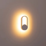 Elegant white indoor wall light installed in bedroom