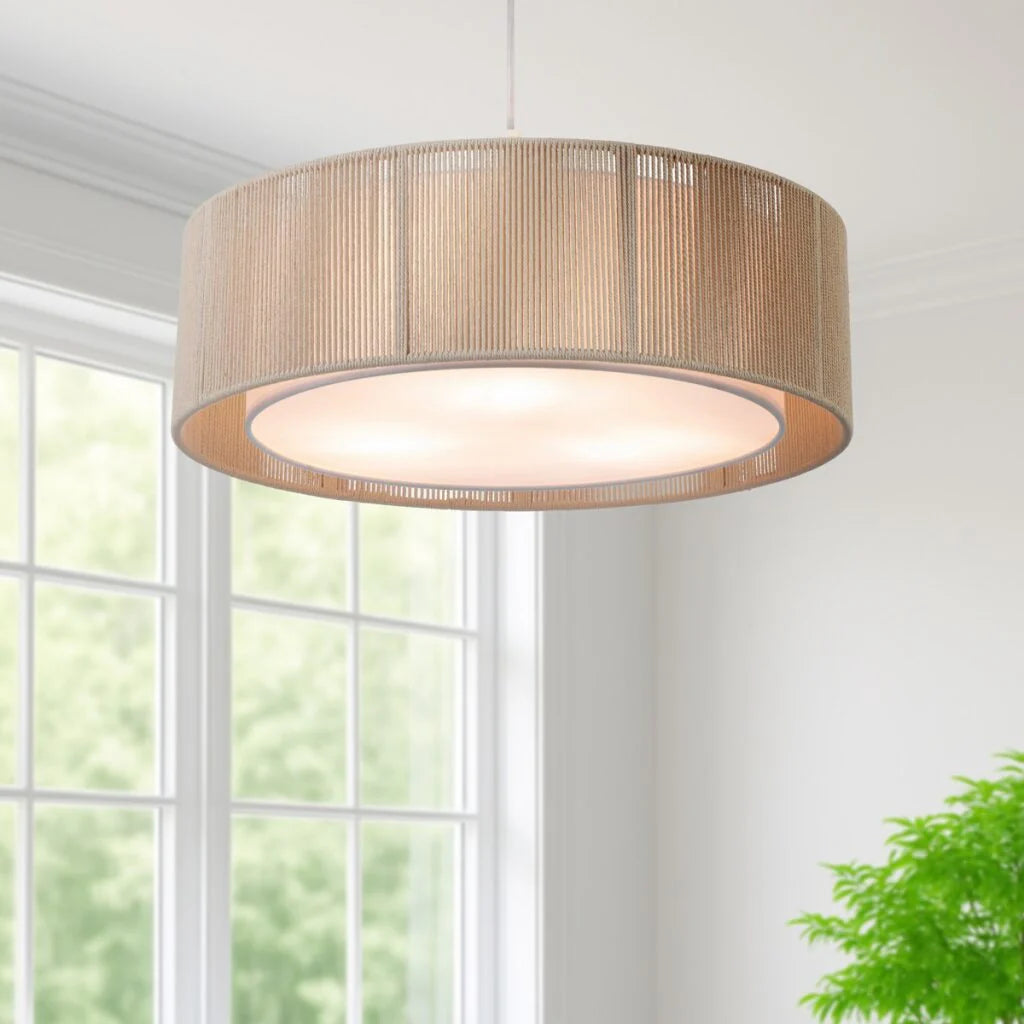 Telbix Cusco 50 Pendant ceiling light fixture with a woven shade in a room with a window and plant