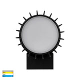 Black exterior wall lantern with transparent glass sides.