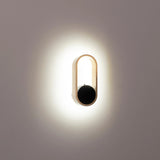 Havit black Ovale LED wall light illuminating entryway