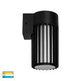 Durable outdoor wall light with black metal and glass construction.