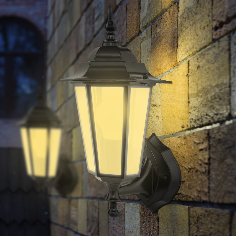 Vintage-style outdoor wall light fixture on a stone wall