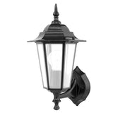 Black outdoor wall light fixture on a white background