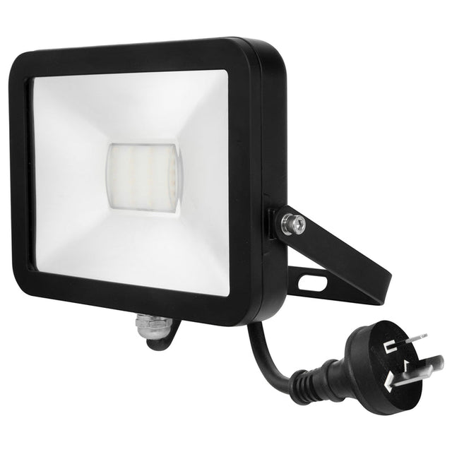 Black outdoor flood light with power cord on a white background