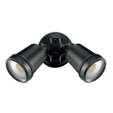 Black outdoor light fixture with two lampshades on a white background
