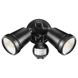 Black outdoor security light fixture with three lights on a white background