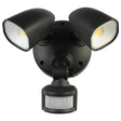 Black outdoor security light with two floodlights and a motion sensor on a white background