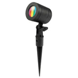 Black outdoor spotlight with rainbow light on a white background