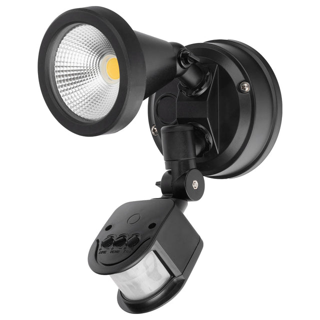 Black outdoor security light with motion sensor on a white background