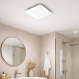 Bathroom interior with a square ceiling light fixture, round mirror, and shower area.