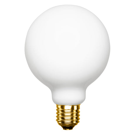 White light bulb with gold base on a white background
