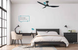 Modern bedroom with a ceiling fan and smart home devices.