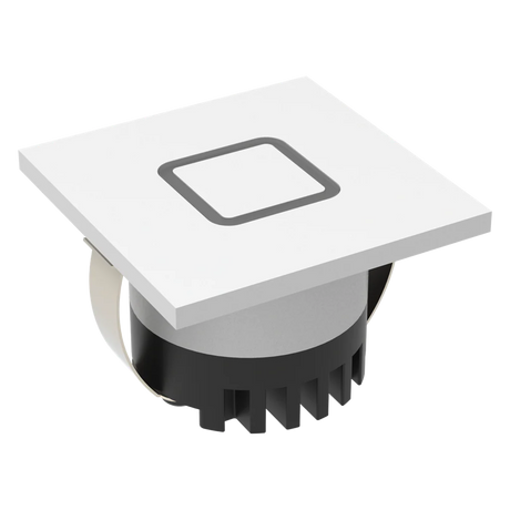 Domus Aura IP20 rated 24V white LED trio steplight for stairs with white cover and black base on a white background