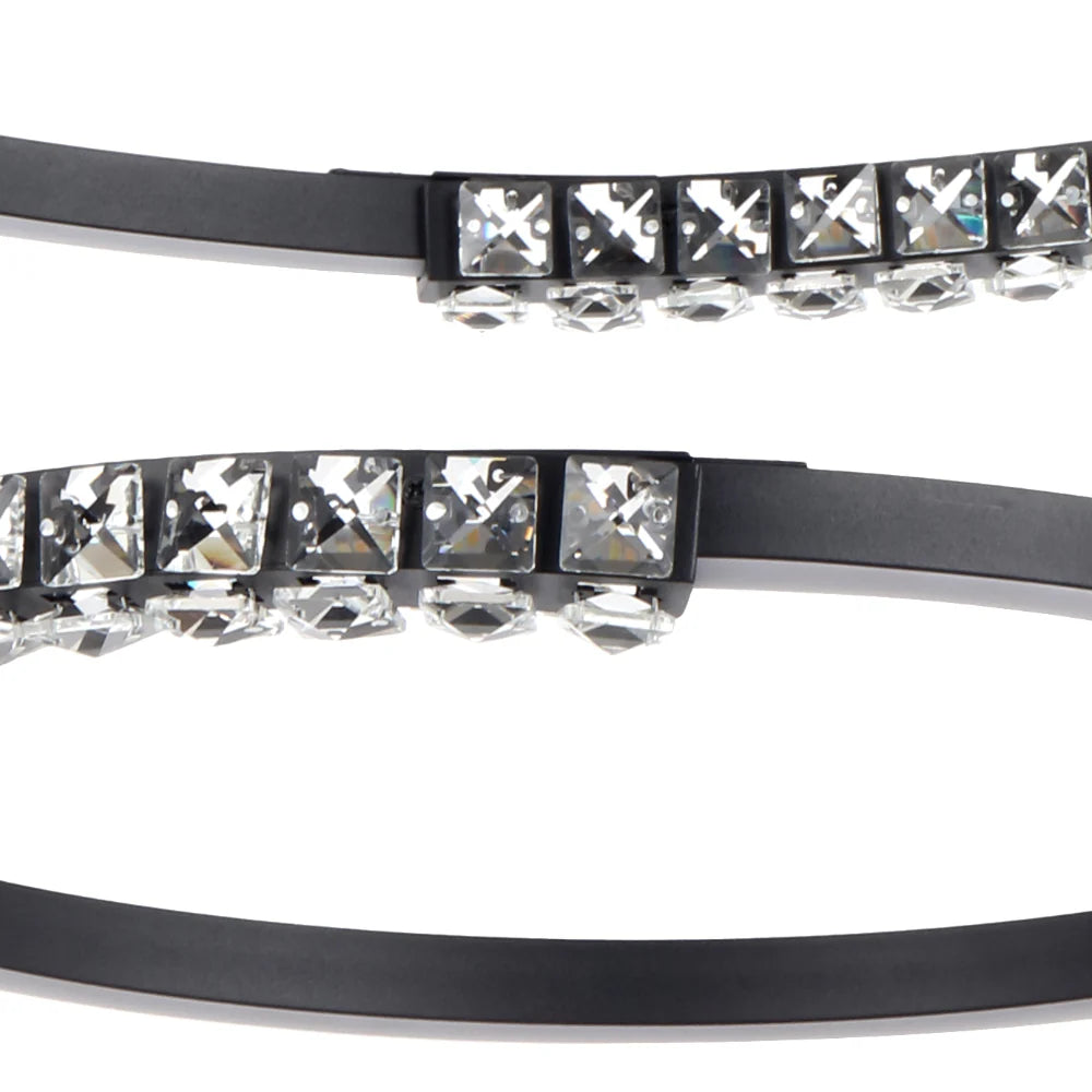 Close‑up showing crystal accents decorating the Telbix Brera pendant’s circular rings.