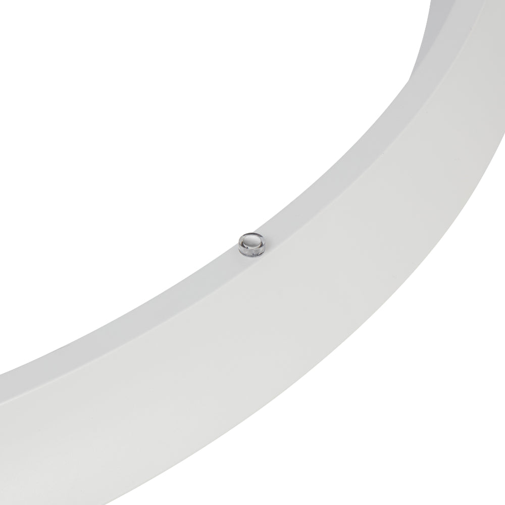 Close-up of a white plastic component with a small metal screw on a white background
